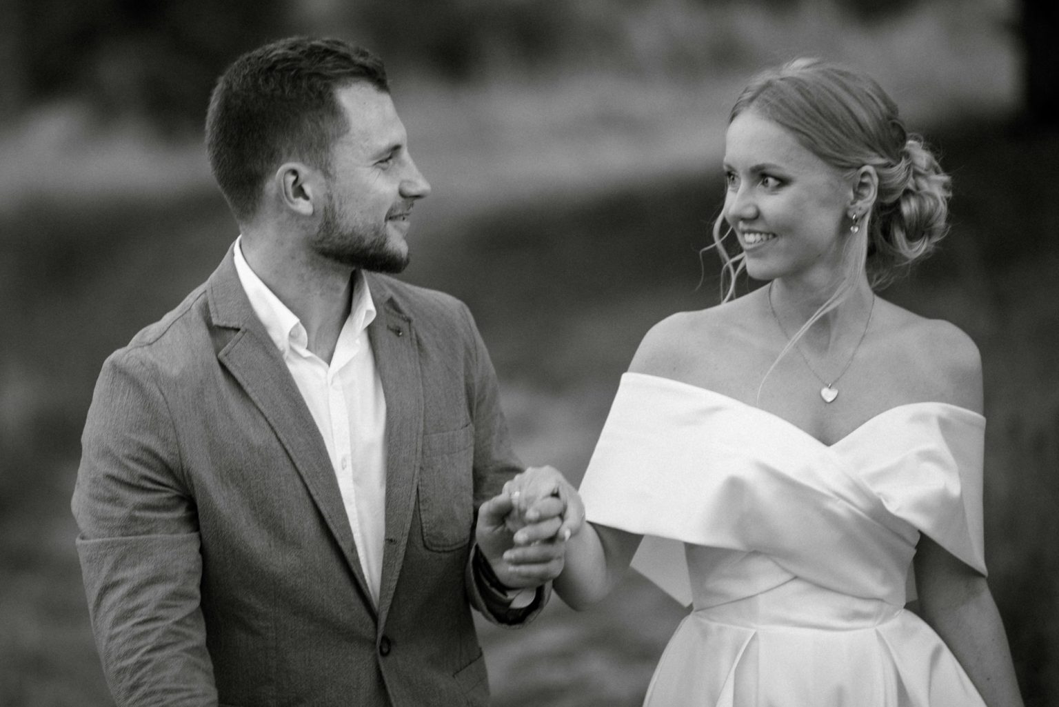 bride and groom on in the woods